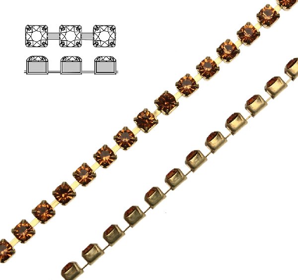 Catena strass, con cristalli Swarovski, base in metallo colore ottone, colore strass TOPAZ