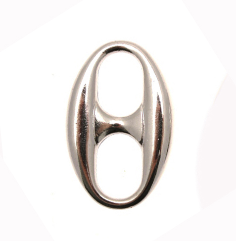 Accessorio a forma di ovale, con due fori, 17x25 mm.