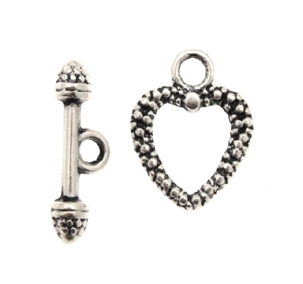 Chiusura a T a forma di cuore puntinato 19x13 mm.