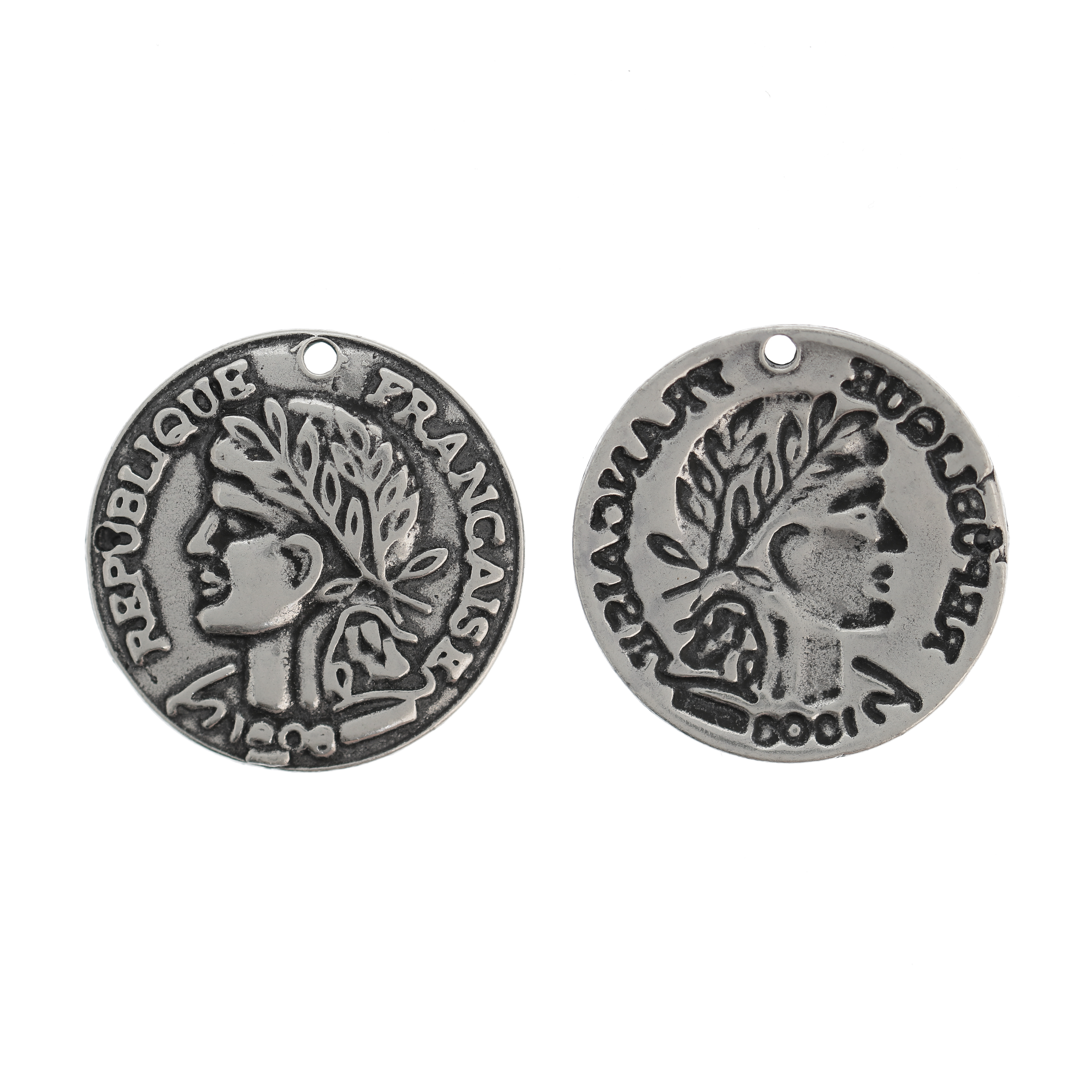 Ciondolo a forma di moneta della Repubblica Francese, diametro 23 mm.