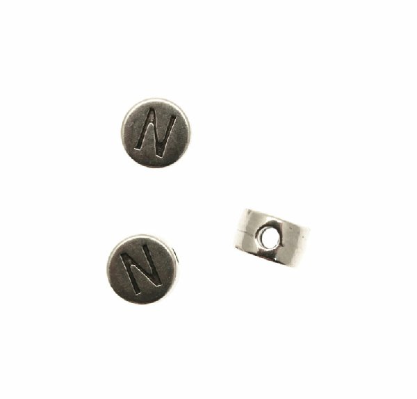 Distanziatore tondo piatto liscio, con disegno lettera "N", 7x4 mm.
