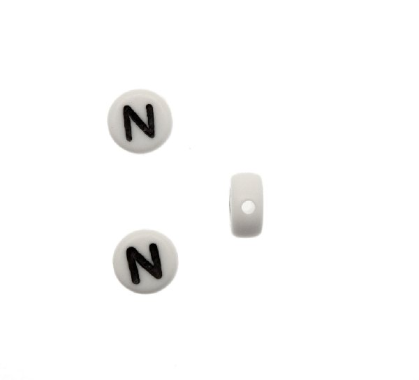 Distanziatore in resina con disegno lettera "N", 7x4 mm.