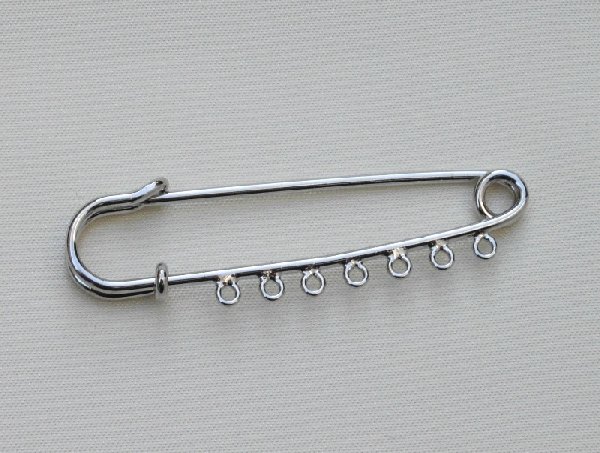 Spilla da balia semplice con 7 anelli 57 mm.