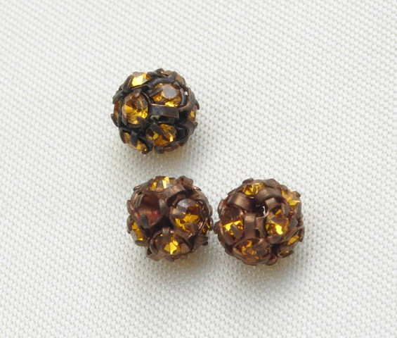 Palla strass, 6 mm., base Rame antico, colore strass Topaz