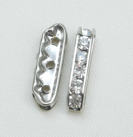 Ponte strass piatto con 3 fori, 21 mm., colore base Rodio