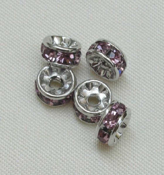 Rondella strass, 5 mm., base Rodio
