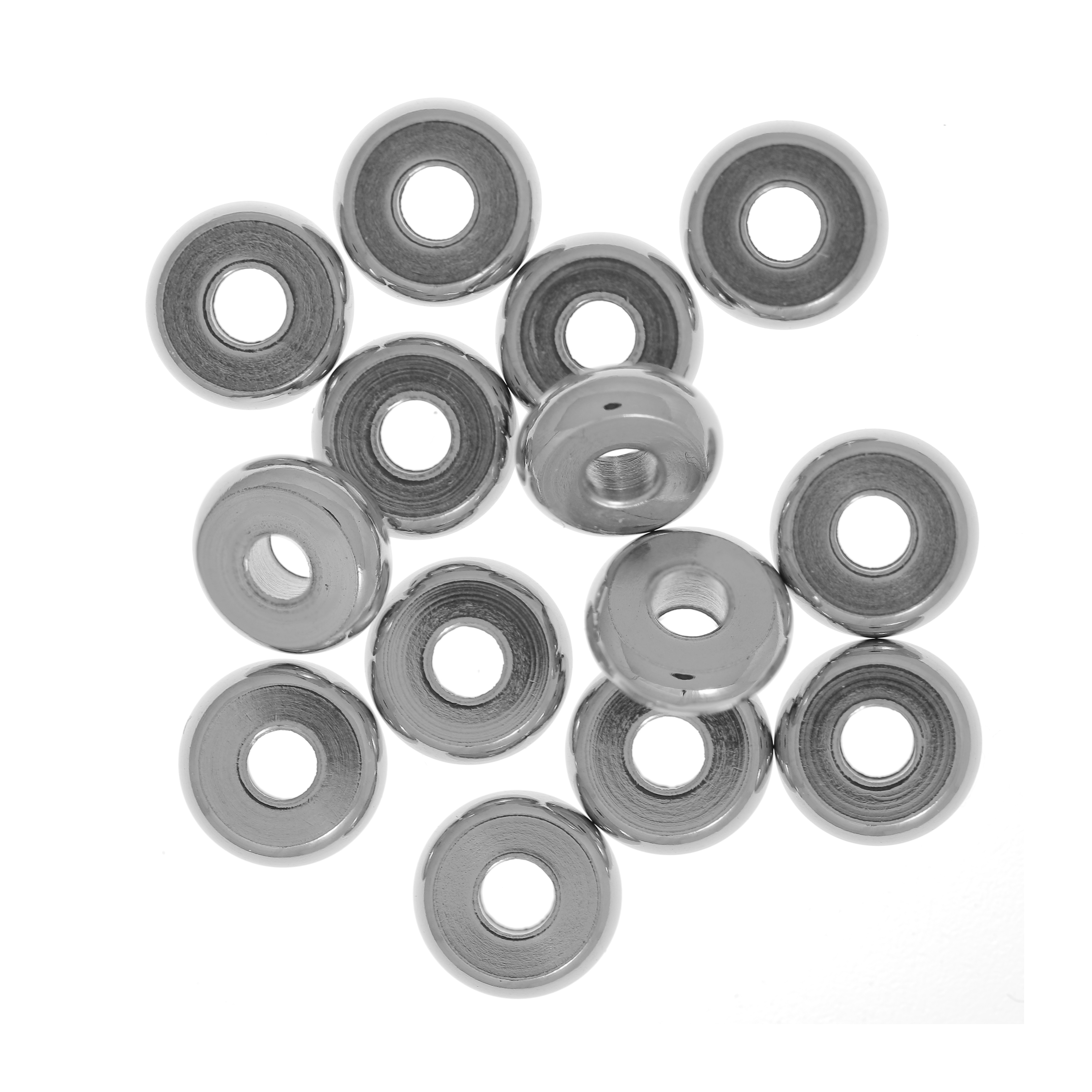 Distanziatore a forma di rondella liscia, leggermente bombata, 6x2x1,8 mm., in Acciaio