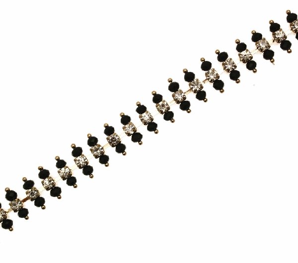 Catena strass composta con rondelline sfaccettate NERE in cristallo suoi lati del castone, colore strass CRYSTAL
