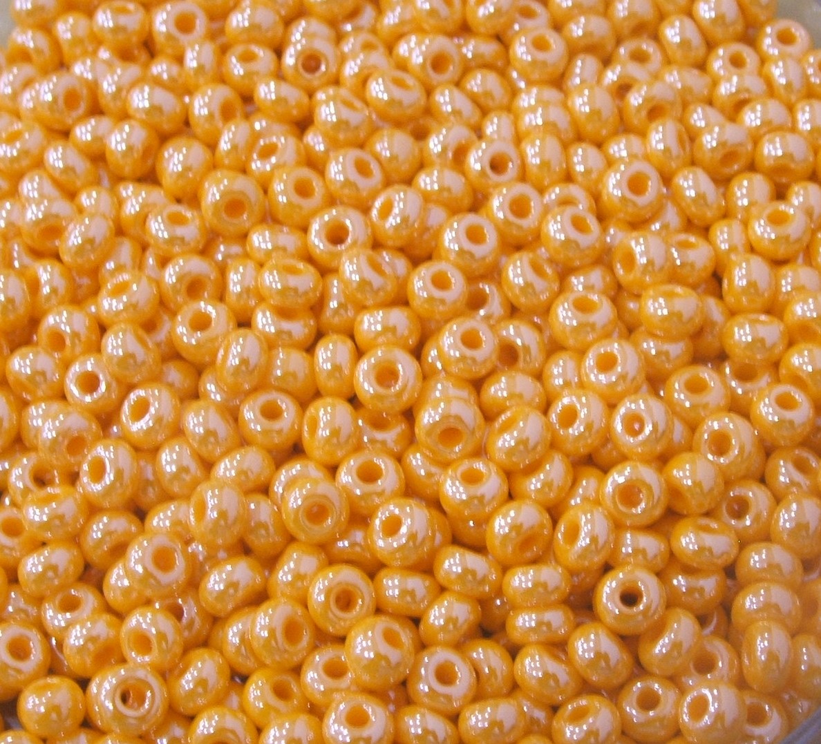 Conteria in vetro, dimensione 4,5x3mm., colore Arancione perlato